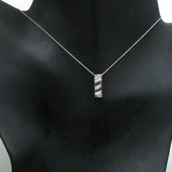 14K White Gold Black And White Diamond Pendant For Women Slider 0.27ct -Urban Jewels Shop 14k black and white diamond pendant 027ct p 40376bod