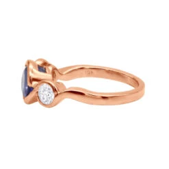 Unique Round Cut Tanzanite And Diamond Engagement Ring 18K White Gold 13 Unique Round Cut Tanzanite And Diamond Engagement Ring 18K White Gold -Urban Jewels Shop channel set round cut tanzanite and diamond engagement ring 18k gold backro